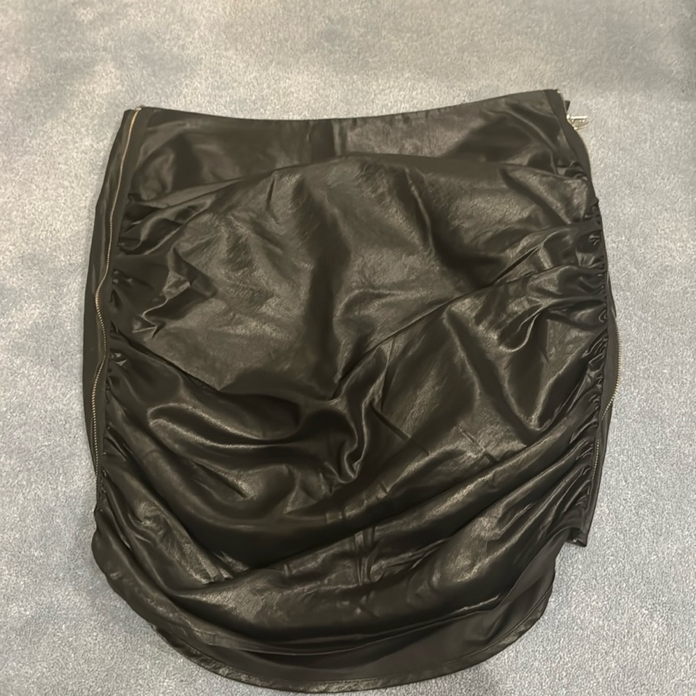 Black mini skirt with zippers down the sides